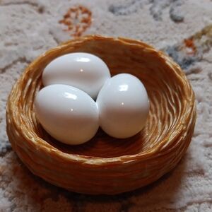 Decorative White Eggs in Tan Nest